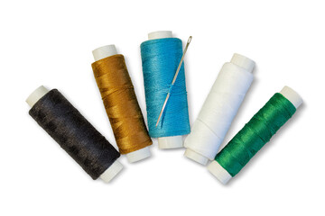 Skeins with multi-colored threads and needle isolated on a transparent background.