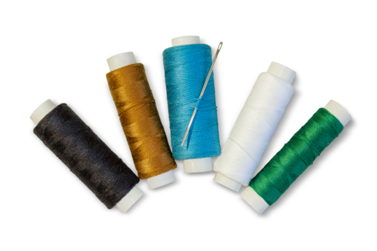 Skeins with multi-colored threads and needle isolated on a transparent background.