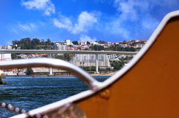 Navigation on the Douro river, against the backdrop of the old city of Porto declared a World...