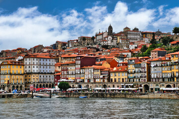 Fototapeta na wymiar An Overview of the city of Porto, Portugal, from the Douro River. The city is located on the left bank of the river