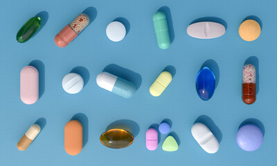 Top view of colorful pills and capsules on blue background. Medication treatment. 3d render.
