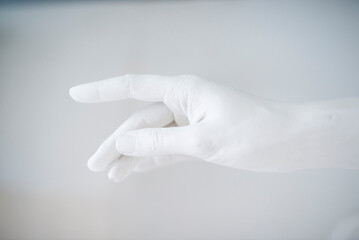 White plaster hands. 