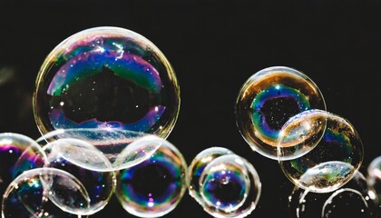 group of soap bubbles on black background - obrazy, fototapety, plakaty