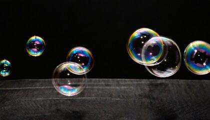 soap bubbles on black background - obrazy, fototapety, plakaty