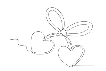 A ribbon Martisor for lovers. Martisor one-line drawing