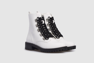 White women's fashion leather ankle boots with rhinestones isolated on white background. Female classic spring autumn lace up high shoes. Blank casual classic footwear. Mock up, template