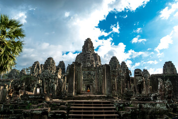 Naklejka premium Exterior of the Bayon temple with gargantuan faces, Angkor Thom, Angkor, Cambodia, Asia