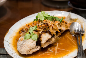 Pan fried fish with sauce in Taiwanese restaurant