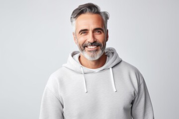 Smiling portrait of a middle aged man on white background - Powered by Adobe