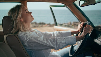 Nervous businesswoman sitting car feeling stress closeup. Woman getting out auto - obrazy, fototapety, plakaty