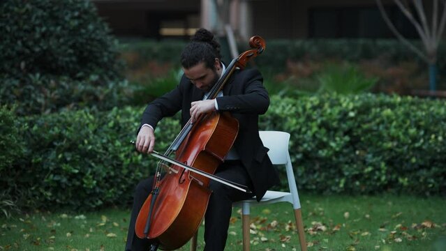 man playing the cello