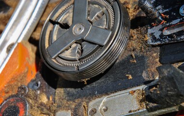 chain saw clutch and drive system close-up. blur in the photo.