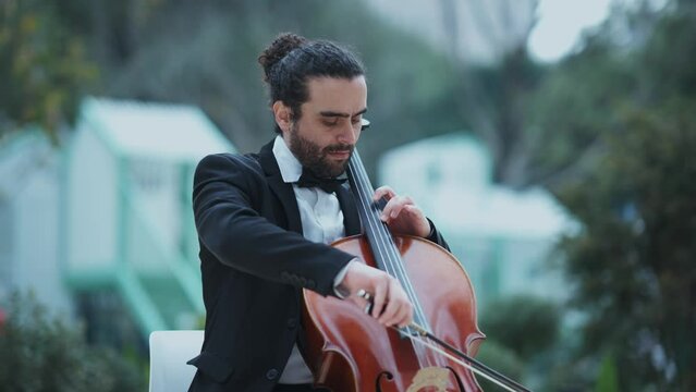 man playing the cello