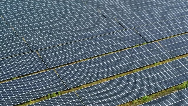 Top down drone Shot of solar panels. Drone looks 90 degrees downwards. Top shot