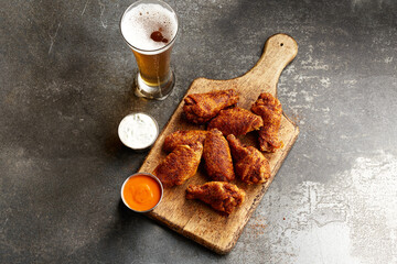 Chicken Wings and Beer with Dipping Sauces