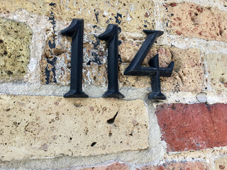 Close up of an house door number 114