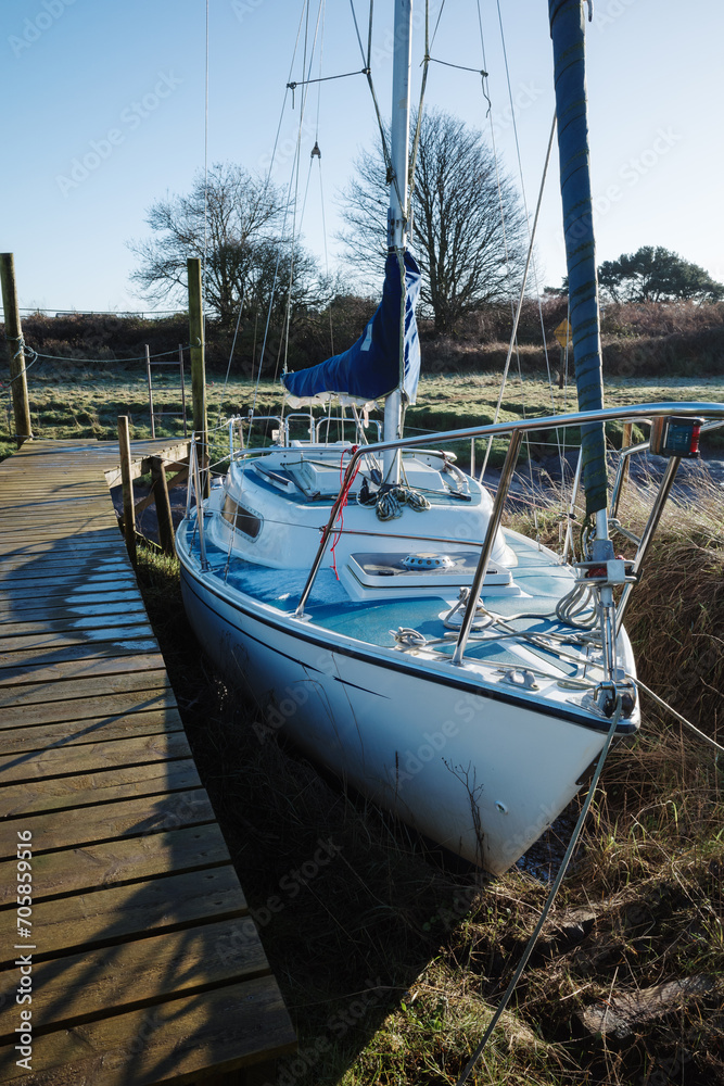 Wall mural skippool creek wooden moorings for boats on the river wyre