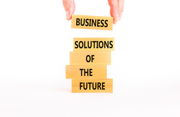 Business solutions of the future symbol. Concept words Business solutions of the future on wooden blocks. Beautiful white table white background. Business solutions of the future concept. Copy space.