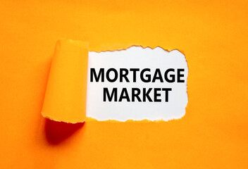 Mortgage market symbol. Concept words Mortgage market on beautiful white paper. Beautiful orange paper background. Business mortgage market concept. Copy space.