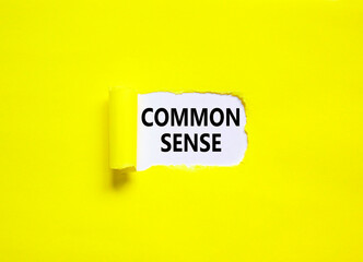 Common sense symbol. Concept words Common sense on beautiful white paper. Beautiful yellow paper background. Business, motivational common sense concept. Copy space.