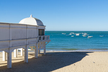 The famous beach Playa de la Caleta with little boats in the background in Cadiz, Spain - 705862703