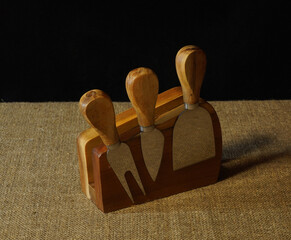 wooden kitchen utensils for slicing cheese
