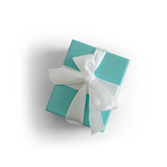 Small turquoise gift box with pretty white bow, with transparent background and shadow