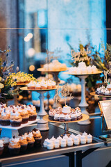 Large table full of treats and desserts at an event