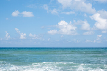 Fototapeta na wymiar cloudy sky over the Mediterranean Sea horizon. The sea's waves magical tranquil seascape