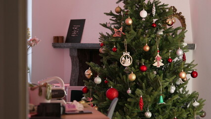 Decorated Christmas Tree During December Holidays - Celebration of Tradition in living room home