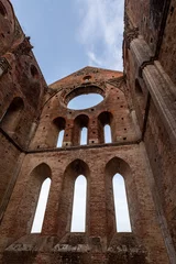Poster Destroyed windows at the presbytery of of the abandoned Cistercian monastery San Galgano in the Tuscany © imagoDens