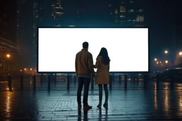 couple stands hand in hand, gazing at a vast empty billboard against the backdrop of a luminous city at night, reflecting on possibilities