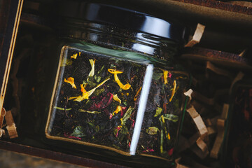 Black and green leaf tea with fruits and berries.