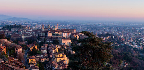 Panoramic view of cityscape Bergamo, aerial view to the city in the mountain valley, Lombardy, Italy.
