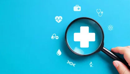 Fotobehang Health insurance concept with magnifying glass on blue background © ytemha34
