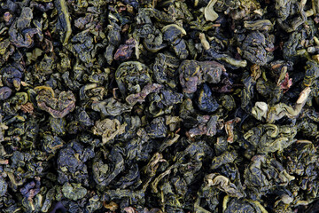 Background of green leaf tea. Healthy eating.