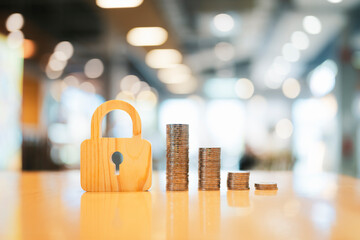 The symbol of the lock and pile of money represents the stability of the currency and interest on...