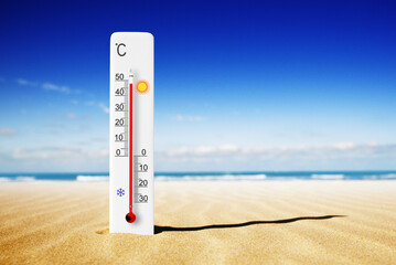 Hot summer day. Celsius scale thermometer in the sand. Ambient temperature plus 48 degrees - obrazy, fototapety, plakaty