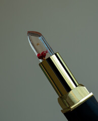 Women's colorless lipstick with a red flower