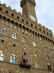 View of the old palace against the blue sky. Close-up. Florence. Italy.