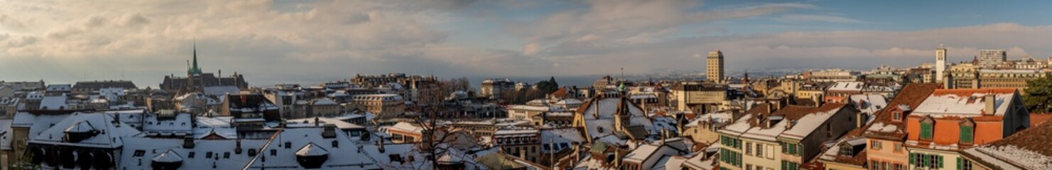 Fototapeta na wymiar Winter landscape of City of Lausanne, Vaud Canton, Switzerland. Houses using Energy for Heating.