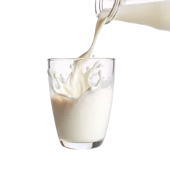 Foto op Plexiglas a glass of milk being poured into a glass © Zacon