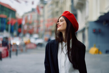 Woman smile walks walks in the city against the backdrop of office buildings, stylish fashionable vintage clothes and make-up, spring walk, travel.