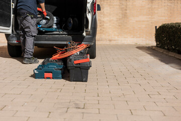 Fototapeta premium van with construction material worker unloading
