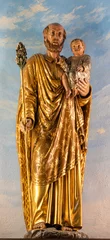  DOMODOSSOLA, ITALY - JULY 19, 2022: The carved polychrome statue of St. Joseph in church Chiesa dei Santi Gervasio e Protasio by unknown baroque artist. © Renáta Sedmáková