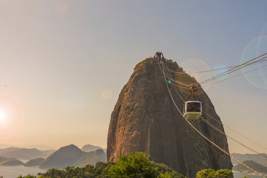 Rio de janeiro Brazil. Sugarloaf Mountain. Cable car crossing to Urca hill. In the background, the mountains and the beach of Niterói.