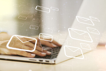 Creative abstract postal envelopes sketch with hands typing on computer keyboard on background,...