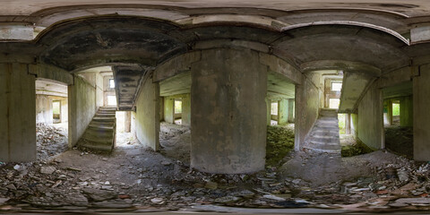 Spherical panorama 360 degrees of ruined staircase in abandoned building with shabby walls and window openings. Full equirectangular projection for virtual reality or VR.