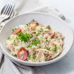 Traditional South Carolina chicken bog dish with smocked sausages, square format