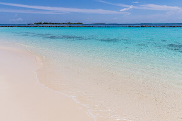 Azure water in the lagoon of the tropical island in the Maldives